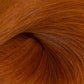 A close-up texture shot of warm coppery auburn hair, showing the fine strands and glossy sheen of the hair product. (Cowgirl Copper / #180)