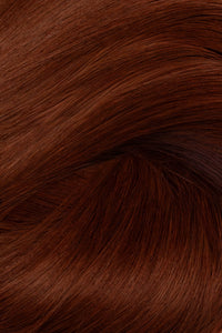 A close-up texture shot of smooth, straight hair in a warm auburn brown shade, showing the fine hair strands and subtle highlights. (Fire Red / #34)