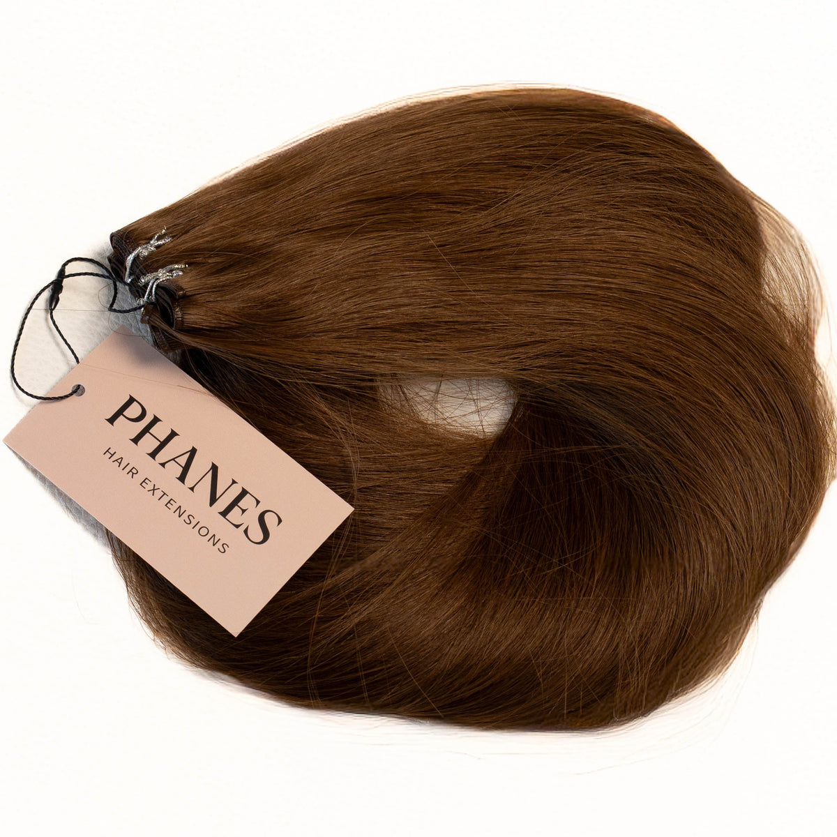 A bundle of medium brown hair extensions with a beige paper tag reading PHANES HAIR EXTENSIONS, set against a plain white background. (Brown / #4)