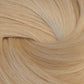 A close-up texture shot of light blonde hair, showing the fine strands and subtle golden-beige tones arranged in a soft swirl. (Blondest Blonde / #60)